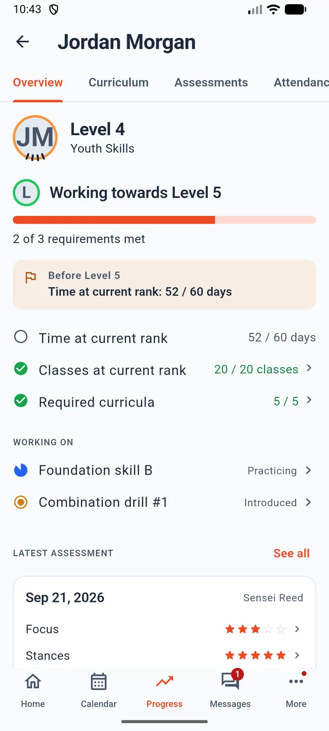 A child's progress screen showing time at current rank, classes at current rank and required curricula as individually met or unmet requirements, plus the latest instructor assessment